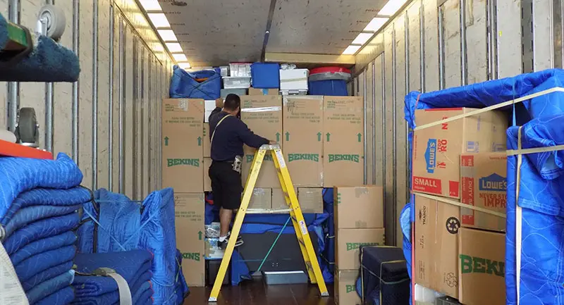 Employee Relocation moving truck packing